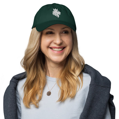 White mockup of a classic dad hat in spruce green worn by a model, for wid Designs.